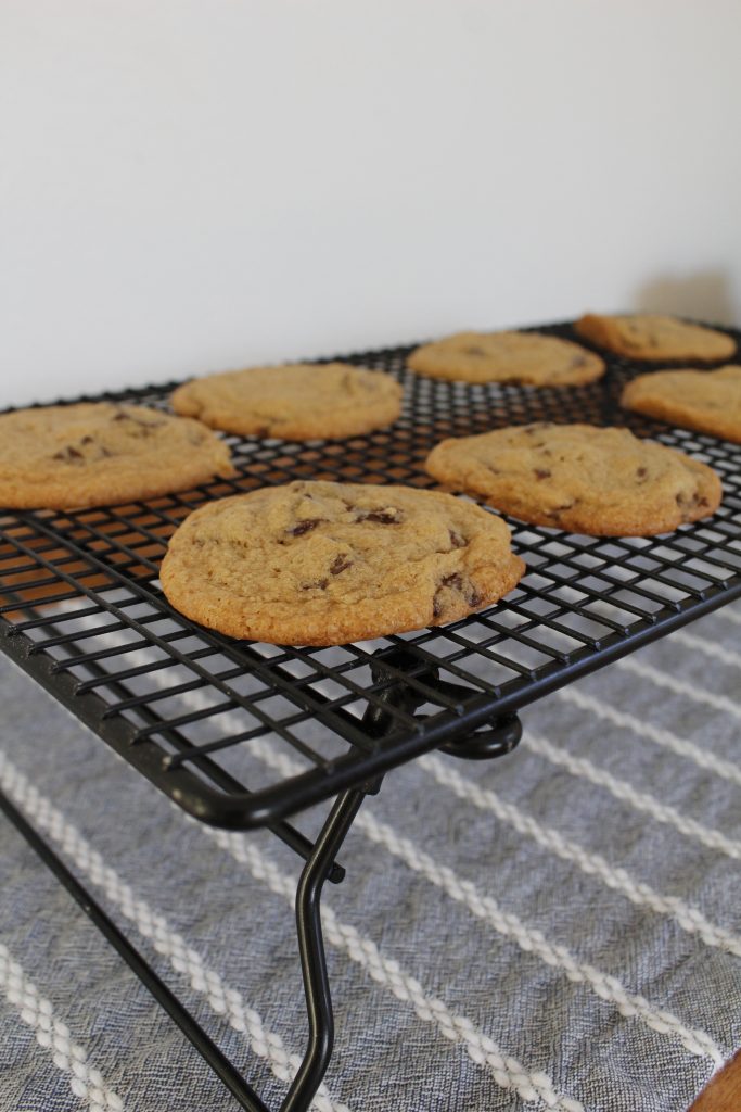Cookies cool on a cooling rack.